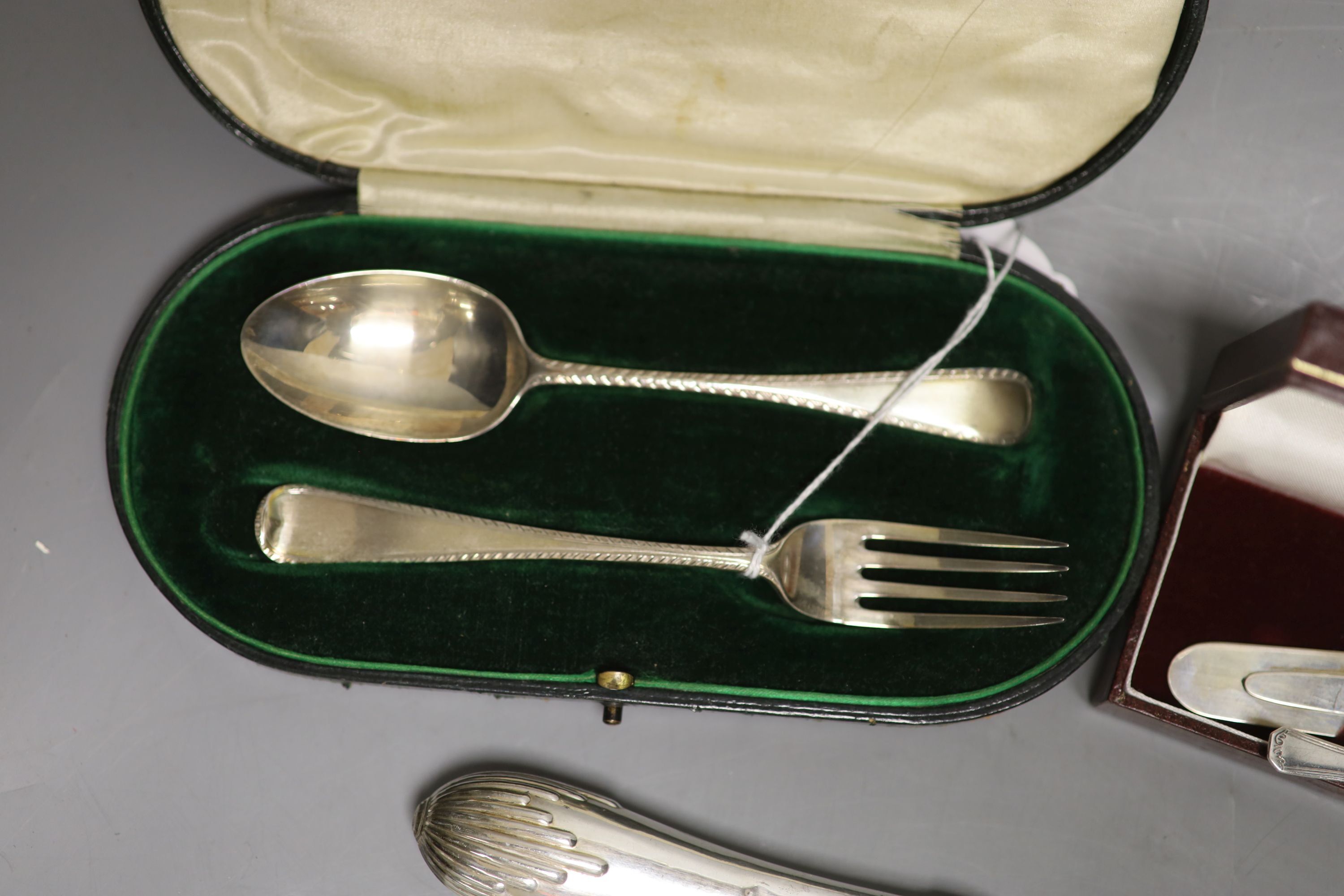 A small collection of silver and plated flatware,